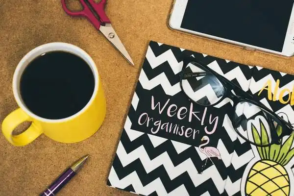 Desk supplies and coffee
