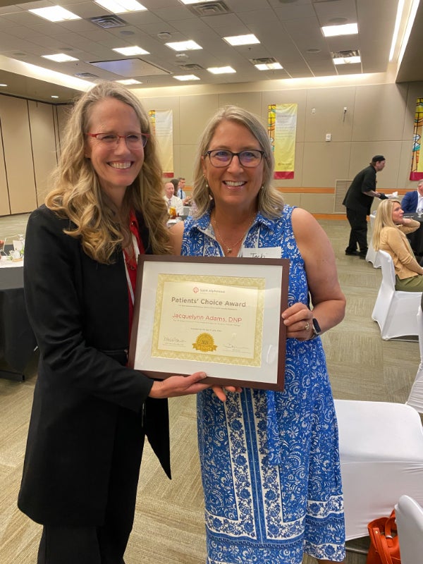 Jacquelyn Adams, Doctor of Nursing Practice and Dr. Giffen.