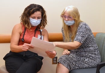 Leah reviewing her cardiology report
